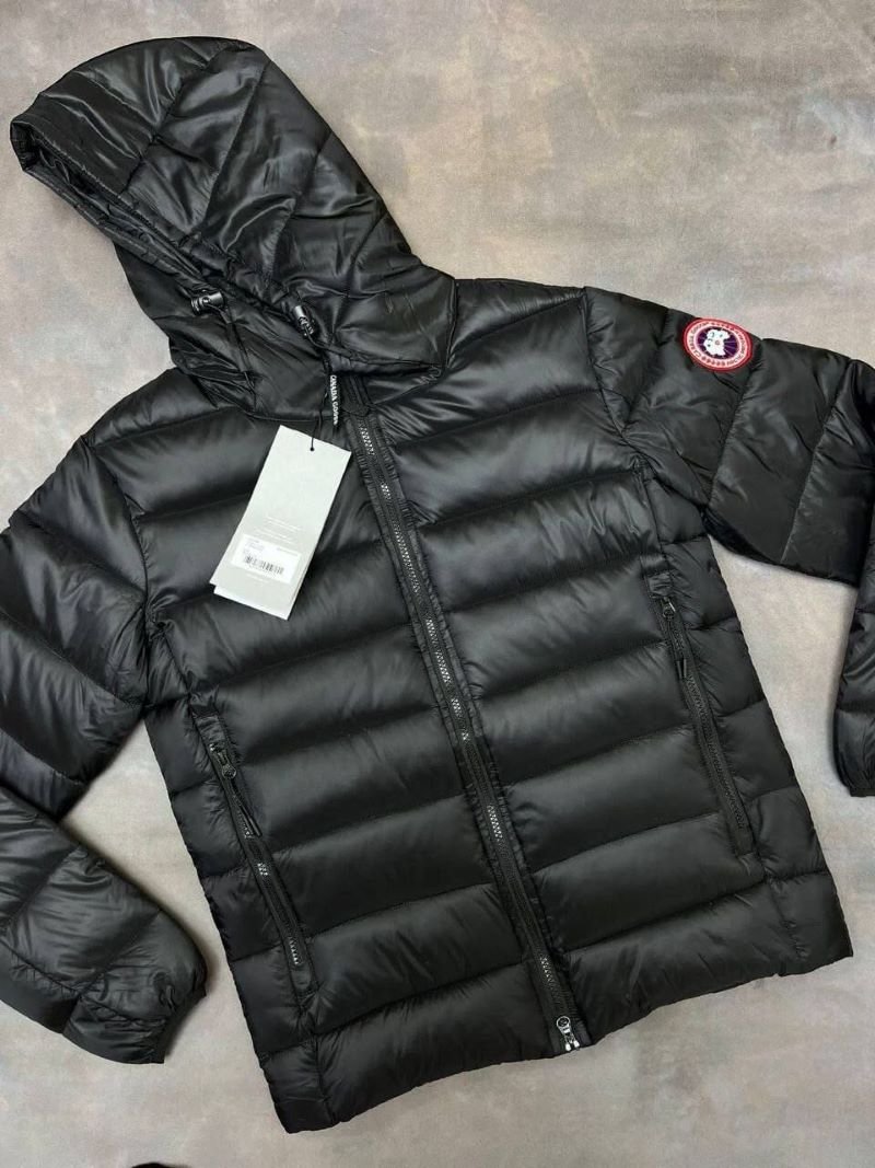 Stay warm and stylish in cold weather with the Canada Goose Glossy Black Puffer Jacket. Featuring a lightweight quilted design with premium insulation, a protective hooded collar, and signature branding accents, this outerwear piece combines everyday functionality with luxury cold-weather style. - Image 2