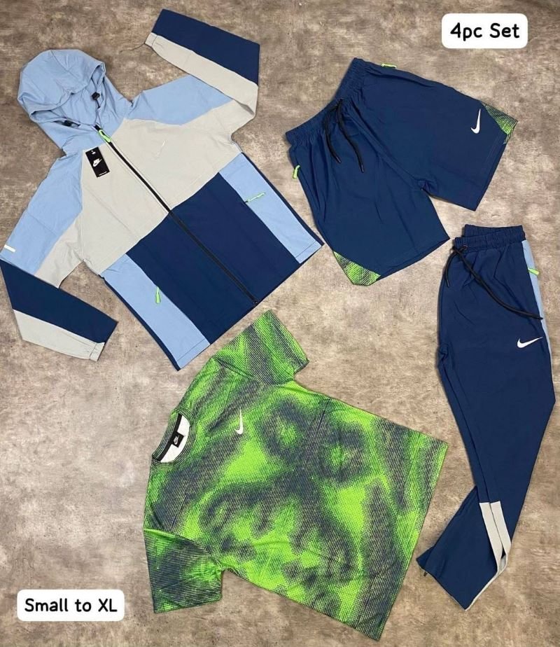 Nike 4-Piece Activewear Set - Lightweight Windbreaker, T-Shirt, Track Pants & Shorts Bundle - Image 2