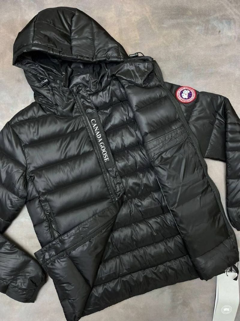 Stay warm and stylish in cold weather with the Canada Goose Glossy Black Puffer Jacket. Featuring a lightweight quilted design with premium insulation, a protective hooded collar, and signature branding accents, this outerwear piece combines everyday functionality with luxury cold-weather style. - Image 3