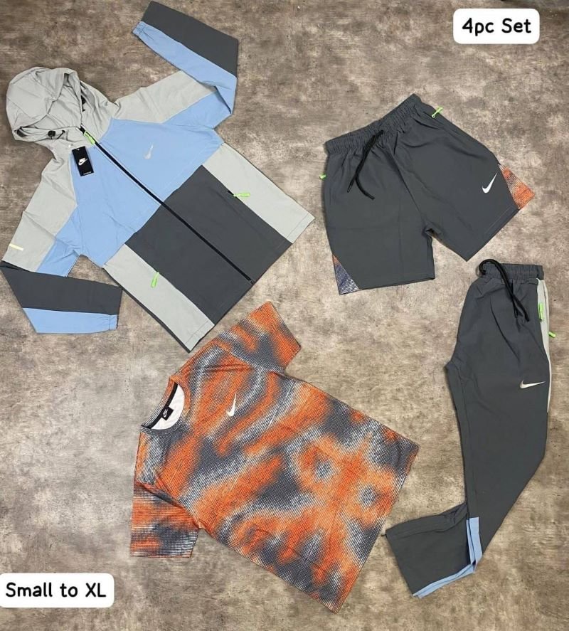 Nike 4-Piece Activewear Set - Lightweight Windbreaker, T-Shirt, Track Pants & Shorts Bundle - Image 3