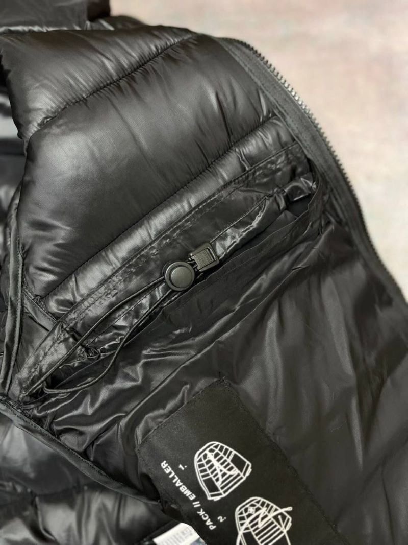 Stay warm and stylish in cold weather with the Canada Goose Glossy Black Puffer Jacket. Featuring a lightweight quilted design with premium insulation, a protective hooded collar, and signature branding accents, this outerwear piece combines everyday functionality with luxury cold-weather style. - Image 4