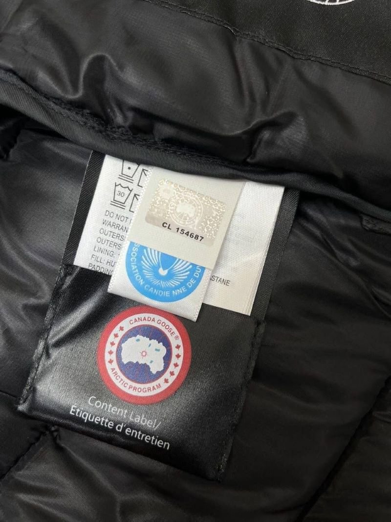 Stay warm and stylish in cold weather with the Canada Goose Glossy Black Puffer Jacket. Featuring a lightweight quilted design with premium insulation, a protective hooded collar, and signature branding accents, this outerwear piece combines everyday functionality with luxury cold-weather style. - Image 8